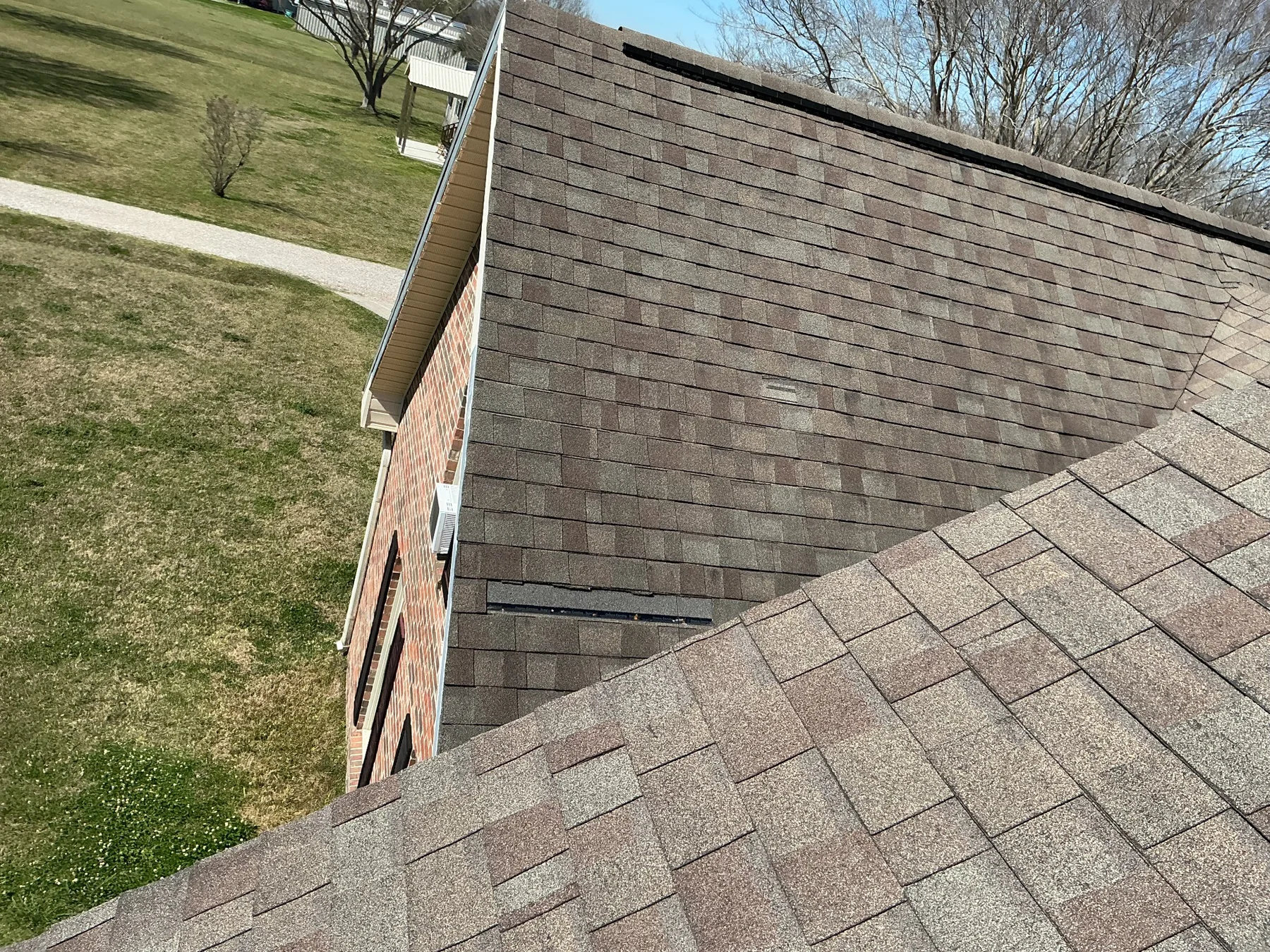 Aging shingles documented during a roof inspection in Opelousas, LA